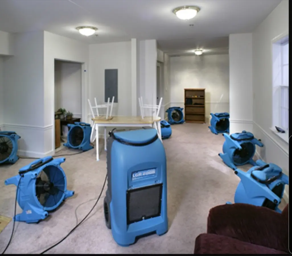 Air movers and dehumidifier setup for Water Damage Restoration in Floresville